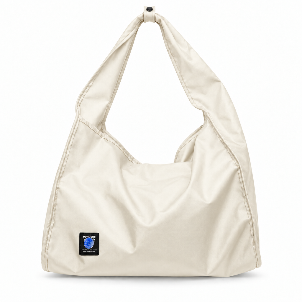 Globe Patch Wide-Strap Slouchy Shoulder Bag - ivory cream, studio view