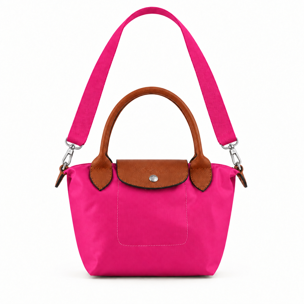 Longchamp style Le Pliage mini handbag with crossbody strap - hot pink, studio view