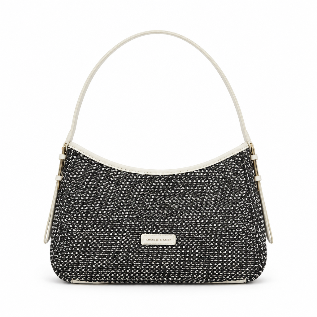 Charles & Keith style woven straw shoulder bag - black and white weave, studio view