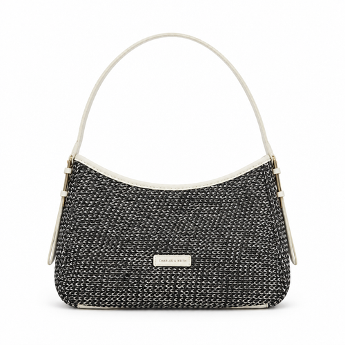 Charles & Keith style woven straw shoulder bag - black and white weave, studio view