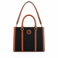 Tory Burch style canvas tote with Double-T logo - black with cognac leather, studio view