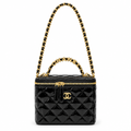 Chanel style quilted vanity case with CHANEL letter handle - black patent, studio view